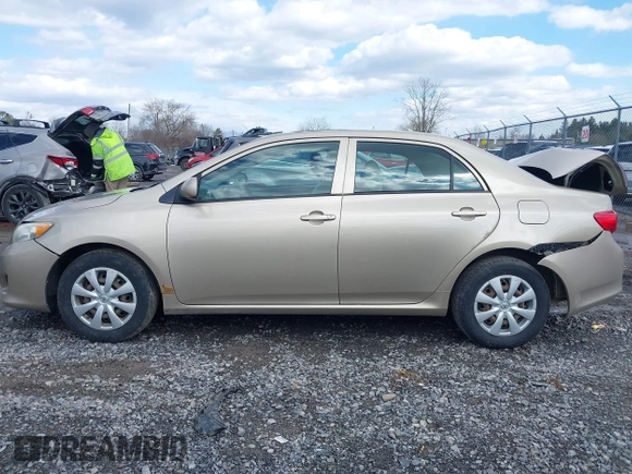 2010 Toyota Corolla with VIN 2T1BU4EE0AC312979, listed as a IAAI auction lot 41981699 with 156,842 mi miles. Bid and sale history available at carsss.com. Image 14.