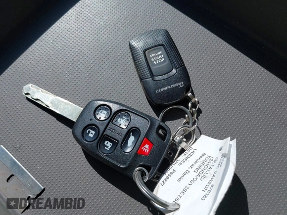 2012 Honda Odyssey Touring with VIN 5FNRL5H9XCB077351, listed as a IAAI auction lot 42045976 with 146,290 mi miles and . Bid and sale history available at DreamBid. Image 11.