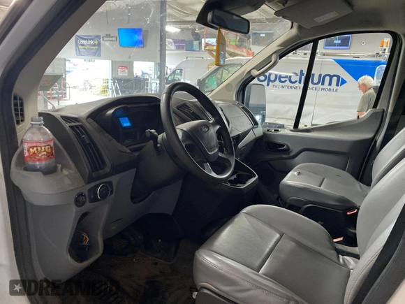 2016 Ford Transit Cargo with VIN 1FTYE1YM8GKB48865, listed as a IAAI auction lot 42843472 with 184,635 mi miles and . Bid and sale history available at DreamBid. Image 4.
