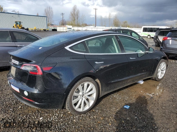 2019 Tesla Model 3 Mid Range with VIN 5YJ3E1EA1KF397390, listed as a Copart auction lot 49862915 with 63,698 mi miles and Salvage Title. Bid and sale history available at carsss.com. Image 3.