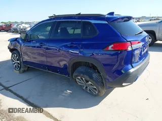 2022 Toyota Corolla Cross XLE with VIN 7MUDAAAG8NV027585, listed as a IAAI auction lot 41781177 with 36,841 mi miles and . Bid and sale history available at DreamBid. Image 3.
