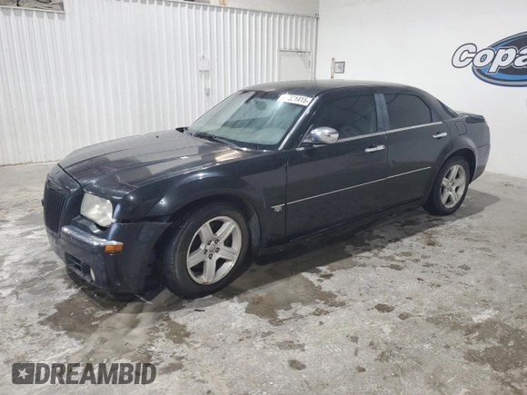 2006 Chrysler 300 C z VIN 2C3KA63H36H290155, wystawiony jako Copart lot #55321415 z przebiegiem Nie podano mil oraz Czysty tytuł • Clean title. Historia ofert i sprzedaży dostępna na DreamBid. Obrazek 1.