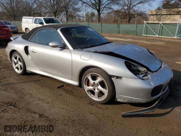 2004 Porsche 911 Carrera S with VIN WP0CB29954S676877, listed as a Copart auction lot 43008885 with 73,052 mi miles and Salvage Title. Bid and sale history available at DreamBid. Image 4.