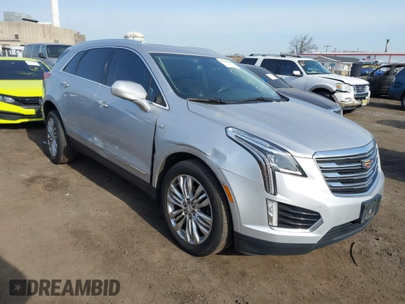 2019 Cadillac XT5 Premium Luxury AWD z VIN 1GYKNFRS2KZ227166, wystawiony jako IAAI lot #41786410 z przebiegiem 99 576 mil mil oraz . Historia ofert i sprzedaży dostępna na DreamBid. Obrazek 1.