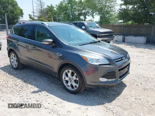 2015 Ford Escape Titanium with VIN 1FMCU0JX9FUB11270, listed as a IAAI auction lot 42671889 with 203,082 mi miles and . Bid and sale history available at DreamBid. Image 1.