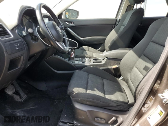 2016 Mazda CX-5 Touring with VIN JM3KE2CY8G0902131, listed as a Copart auction lot 53354745 with 123,474 mi miles and Salvage Title. Bid and sale history available at carsss.com. Image 7.