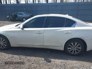 2014 Infiniti Q50 Premium with VIN JN1BV7AR5EM703788, listed as a IAAI auction lot 42118192 with 153,859 mi miles and . Bid and sale history available at DreamBid. Image 14.
