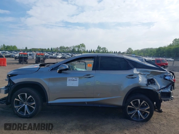 2021 Lexus RX 350 с VIN 2T2HZMDA8MC264884, выставлен на аукционе IAAI как лот 42268649 с пробегом 56 489 миль миль и . История ставок и продаж доступна на DreamBid. Изображение 15.