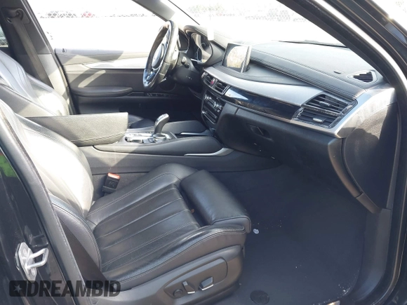 2018 BMW X6 sDrive35i with VIN 5UXKU0C5XJ0G80724, listed as a IAAI auction lot 41274338 with 122,696 mi miles. Bid and sale history available at carsss.com. Image 5.