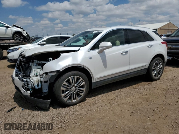 2018 Cadillac XT5 Premium Luxury AWD with VIN 1GYKNFRS4JZ128606, listed as a Copart auction lot 61941695 with 33,511 mi miles and Salvage title. Bid and sale history available at DreamBid. Image 1.