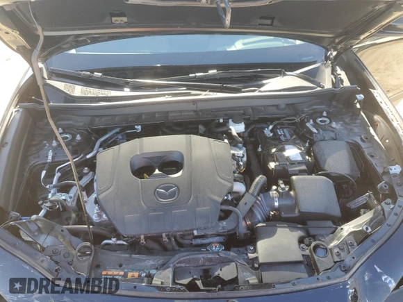 2024 Mazda CX-30 S with VIN 3MVDMBAM0RM635991, listed as a Copart auction lot 48979595 with 11,640 mi miles and Salvage title. Bid and sale history available at DreamBid. Image 13.
