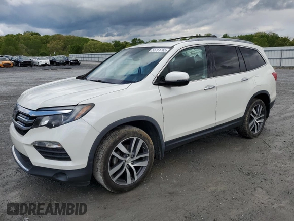 2017 Honda Pilot Touring with VIN 5FNYF6H91HB092062, listed as a Copart auction lot 52761765 with 141,750 mi miles and Salvage Title. Bid and sale history available at DreamBid. Image 1.
