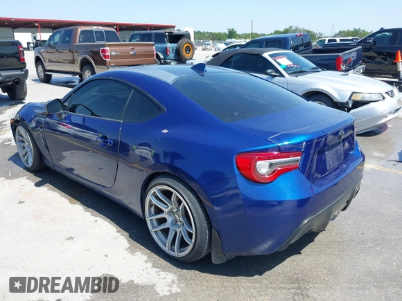 2015 Scion FR-S with VIN JF1ZNAA18F9712580, listed as a IAAI auction lot 42223595 with 157,384 mi miles and . Bid and sale history available at carsss.com. Image 3.