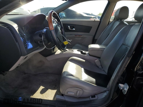 2004 Cadillac CTS with VIN 1G6DM577040103840, listed as a Copart auction lot 55284675 with 113,007 mi miles and Salvage title. Bid and sale history available at DreamBid. Image 7.