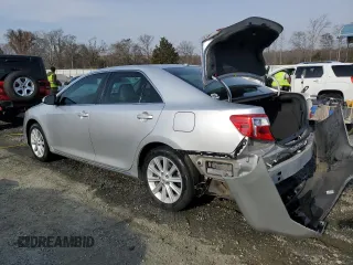 2012 Toyota Camry L with VIN 4T1BF1FK5CU151057, listed as a Copart auction lot 49242725 with 197,007 mi miles and Salvage Title. Bid and sale history available at carsss.com. Image 2.