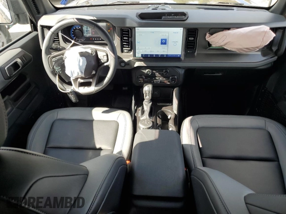 2024 Ford Bronco Big Bend с VIN 1FMDE7AH3RLB46917, выставлен на аукционе Copart как лот 52146385 с пробегом 792 миль миль и Списание • Salvage title. История ставок и продаж доступна на DreamBid. Изображение 8.