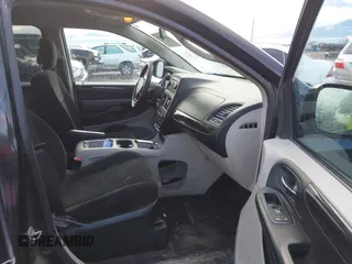 2012 Dodge Grand Caravan SXT with VIN 2C4RDGCG3CR318900, listed as a IAAI auction lot 41145958 with 201,117 mi miles and . Bid and sale history available at DreamBid. Image 5.