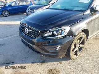 2014 Volvo XC60 R-Design Premier Plus z VIN YV4902DZ4E2537605, wystawiony jako IAAI lot #41126501 z przebiegiem 119 644 mil mil oraz . Historia ofert i sprzedaży dostępna na DreamBid. Obrazek 6.
