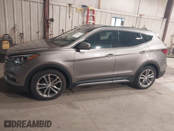 2017 Hyundai Santa Fe 2.0T with VIN 5XYZUDLA4HG424259, listed as a IAAI auction lot 42657783 with 213,040 mi miles and . Bid and sale history available at DreamBid. Image 14.