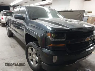 2017 Chevrolet Silverado 1500 LT with VIN 1GCUKREC4HF179560, listed as a IAAI auction lot 41460202 with 136,675 mi miles and . Bid and sale history available at DreamBid. Image 1.