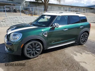2019 MINI Countryman Cooper S with VIN WMZYT5C58K3E69954, listed as a Copart auction lot 71786544 with 59,971 mi miles and Salvage Title. Bid and sale history available at carsss.com. Image 1.