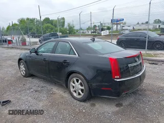 2009 Cadillac CTS RWD with VIN 1G6DF577190137609, listed as a IAAI auction lot 42196209 with 111,843 mi miles and . Bid and sale history available at DreamBid. Image 3.