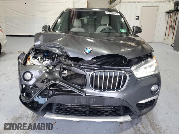 2017 BMW X1 xDrive28i with VIN WBXHT3C38H5F73265, listed as a Copart auction lot 45148825 with 95,850 mi miles and Salvage Title. Bid and sale history available at carsss.com. Image 5.