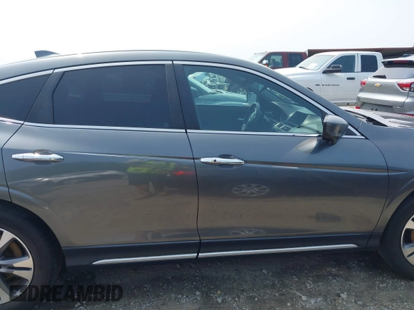 2014 Honda Crosstour EX-L z VIN 5J6TF2H59EL000957, wystawiony jako IAAI lot #42383656 z przebiegiem 116 317 mil mil oraz . Historia ofert i sprzedaży dostępna na DreamBid. Obrazek 14.