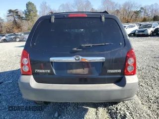 2005 Mazda Tribute i with VIN 4F2YZ02Z05KM38128, listed as a Copart auction lot 83175604 with 320,405 mi miles and Salvage Title. Bid and sale history available at carsss.com. Image 6.