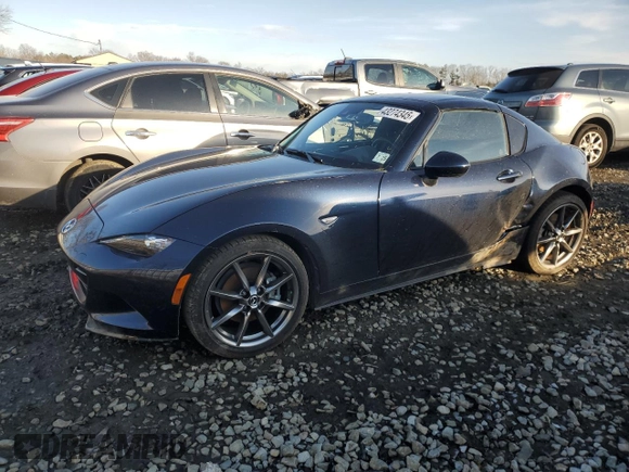 2021 Mazda MX-5 Miata Grand Touring z VIN JM1NDAM70M0458182, wystawiony jako Copart lot #43274345 z przebiegiem 14 483 mil mil oraz Czysty tytuł • Clean title. Historia ofert i sprzedaży dostępna na DreamBid. Obrazek 1.