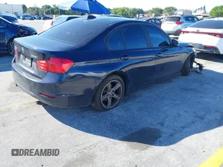 2015 BMW 3 Series 328i with VIN WBA3A5G55FNS91189, listed as a IAAI auction lot 41296279 with 115,120 mi miles. Bid and sale history available at carsss.com. Image 4.