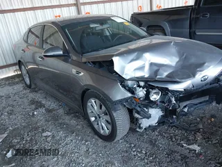 2018 Kia Optima S with VIN 5XXGT4L32JG254800, listed as a IAAI auction lot 41425129 with 108,158 mi miles and . Bid and sale history available at DreamBid. Image 1.