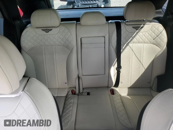 2017 Bentley Bentayga W12 z VIN SJAAC2ZV1HC014037, wystawiony jako Copart lot #73797634 z przebiegiem Nie podano mil oraz Szkoda całkowita • Salvage title. Historia ofert i sprzedaży dostępna na DreamBid. Obrazek 10.