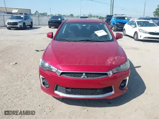 2016 Mitsubishi Lancer ES with VIN JA32U2FU6GU011198, listed as a IAAI auction lot 41932443 with 122,991 mi miles. Bid and sale history available at carsss.com. Image 12.