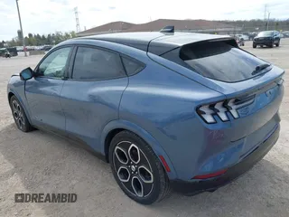 2023 Ford Mustang Mach-E GT z VIN 3FMTK4SE1PMA06903, wystawiony jako IAAI lot #42158874 z przebiegiem 55 325 mil mil oraz . Historia ofert i sprzedaży dostępna na DreamBid. Obrazek 3.