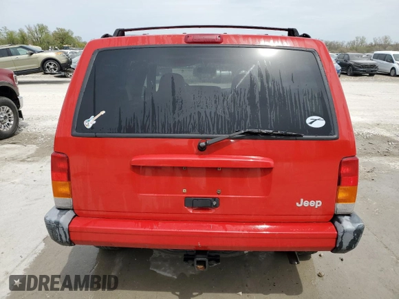 1999 Jeep Cherokee Sport with VIN 1J4FF68S3XL667570, listed as a Copart auction lot 52821105 with 173,712 mi miles and Salvage Title. Bid and sale history available at DreamBid. Image 6.
