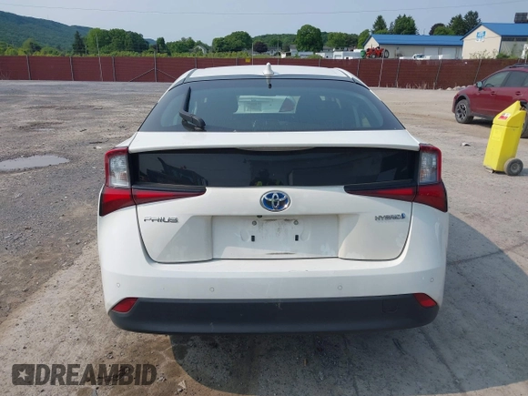 2021 Toyota Prius L Eco with VIN JTDKAMFU7M3147668, listed as a IAAI auction lot 42390394 with 80,831 mi miles and . Bid and sale history available at DreamBid. Image 17.