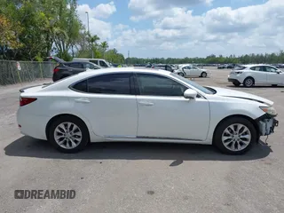 2013 Lexus ES 300h Hybrid with VIN JTHBW1GG0D2002520, listed as a IAAI auction lot 42049567 with 195,538 mi miles. Bid and sale history available at carsss.com. Image 14.