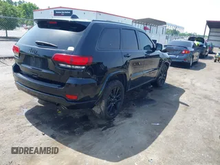 2018 Jeep Grand Cherokee Altitude with VIN 1C4RJEAG7JC354191, listed as a IAAI auction lot 42276081 with 51,220 mi miles and . Bid and sale history available at DreamBid. Image 4.