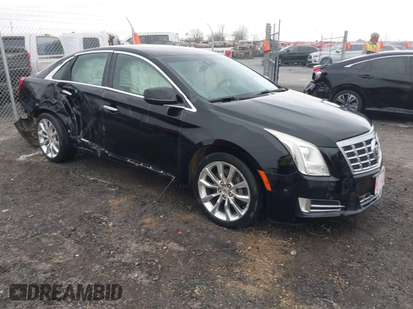 2015 Cadillac XTS Luxury with VIN 2G61M5S38F9138545, listed as a IAAI auction lot 41690696 with 136,460 mi miles and . Bid and sale history available at DreamBid. Image 1.