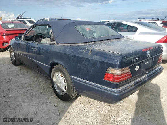 1994 Mercedes-Benz E Class with VIN WDBEA66EXRC086128, listed as a Copart auction lot 74996054 with NaN miles and Salvage Title. Bid and sale history available at carsss.com. Image 2.