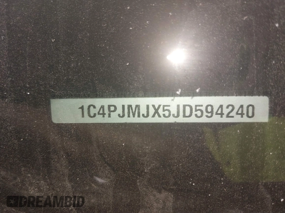 2018 Jeep Cherokee Overland with VIN 1C4PJMJX5JD594240, listed as a IAAI auction lot 41285832 with 130,334 mi miles. Bid and sale history available at carsss.com. Image 9.