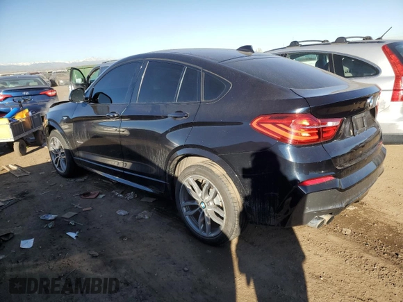 2015 BMW X4 xDrive35i with VIN 5UXXW5C56F0E87474, listed as a Copart auction lot 39752004 with 116,806 mi miles. Bid and sale history available at carsss.com. Image 2.