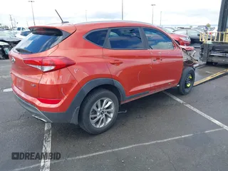 2016 Hyundai Tucson Sport with VIN KM8J33A20GU154428, listed as a IAAI auction lot 41722993 with 76,091 mi miles. Bid and sale history available at carsss.com. Image 4.
