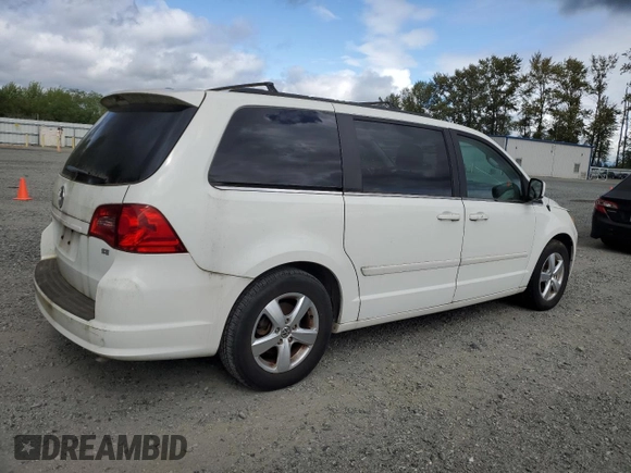 2011 Volkswagen Routan SE with VIN 2V4RW3DG0BR789523, listed as a Copart auction lot 61761785 with 124,530 mi miles and Clean title. Bid and sale history available at DreamBid. Image 3.