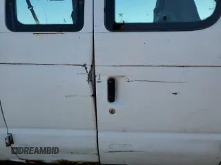 2001 Ford Econoline Passenger XL with VIN 1FMRE11201HB08051, listed as a Copart auction lot 54983885 with 159,509 mi miles and Clean title. Bid and sale history available at DreamBid. Image 11.