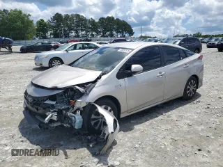 2021 Toyota Prius LE with VIN JTDKAMFPXM3184126, listed as a Copart auction lot 56857675 with 54,676 mi miles and Clean Title. Bid and sale history available at DreamBid. Image 1.