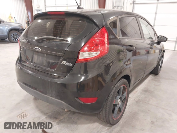 2013 Ford Fiesta SE with VIN 3FADP4EJ5DM195186, listed as a IAAI auction lot 42046227 with 137,794 mi miles. Bid and sale history available at carsss.com. Image 4.