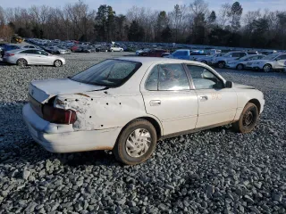 1994 Toyota Camry LE with VIN 4T1SK12E4RU396095, listed as a Copart auction lot 42987105 with 289,218 mi miles and Salvage Title. Bid and sale history available at carsss.com. Image 3.