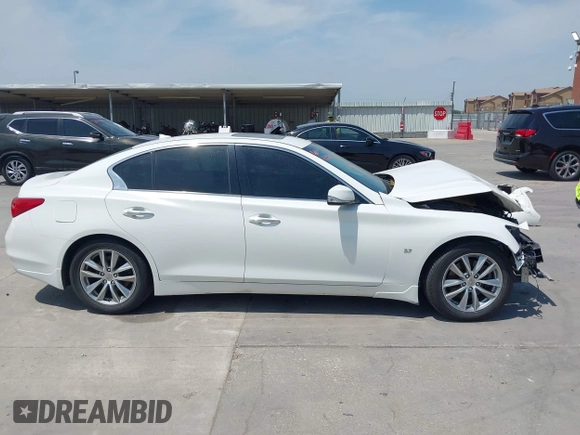 2014 Infiniti Q50 Premium z VIN JN1BV7AP8EM691683, wystawiony jako IAAI lot #42064258 z przebiegiem 146 805 mil mil oraz . Historia ofert i sprzedaży dostępna na DreamBid. Obrazek 14.